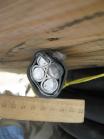 Фото сечения кабеля АВБбШв 3х120+1х70 с четырьмя алюминиевыми жилами в ПВХ изоляции, с бронёй в виде лент и в ПВХ шланге