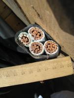 Фотография медного четырёхжильного кабеля ВВГ 3х120+1х50 в поливинилхлоридной изоляции и оболочке для монтажа на улице и в зданиях