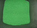 Фотография гранул красителя ПВХ пластиката изоляции зелёного цвета