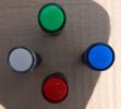 Светосигнальные индикаторы марки AD-16DS производства компании IEK в белом, зелёном, синем и красном цветах
