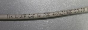 Фотография маркировки кабеля UTP 4x2x0,51 категории 5Е для внутренней прокладки выпуска компании ИЭК