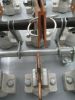Фотография подпружиненных стальными кольцами двух медных шин подвижного контакта трёхполюсного выключателя-разъединителя ПЦ-4